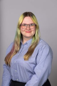 Headshot of team member Emm Dearing
